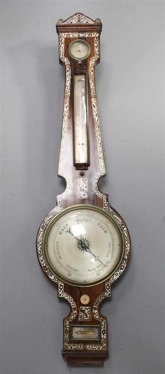 A William IV mother of pearl inset rosewood wheel barometer, height 39.5in.